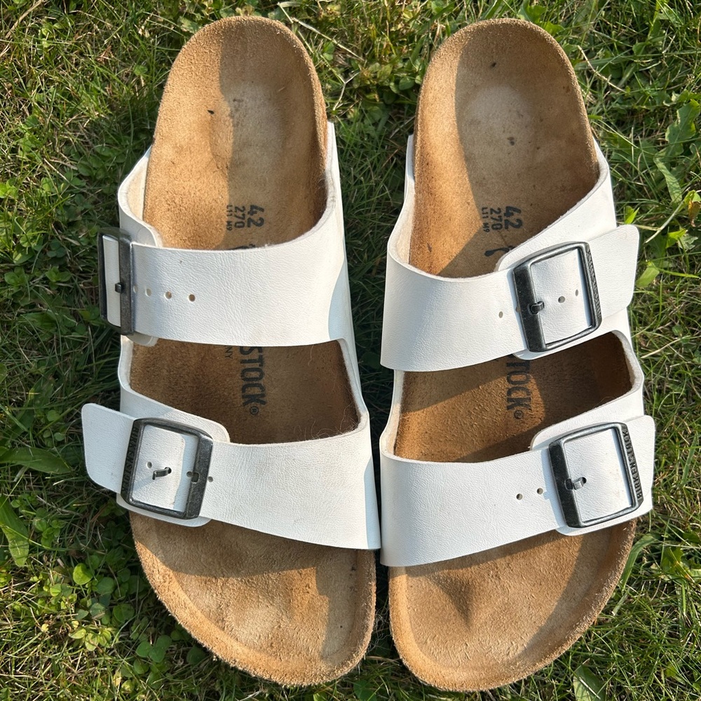 Birkenstock size 42 (Size 11 women). White with pewter buckles.
